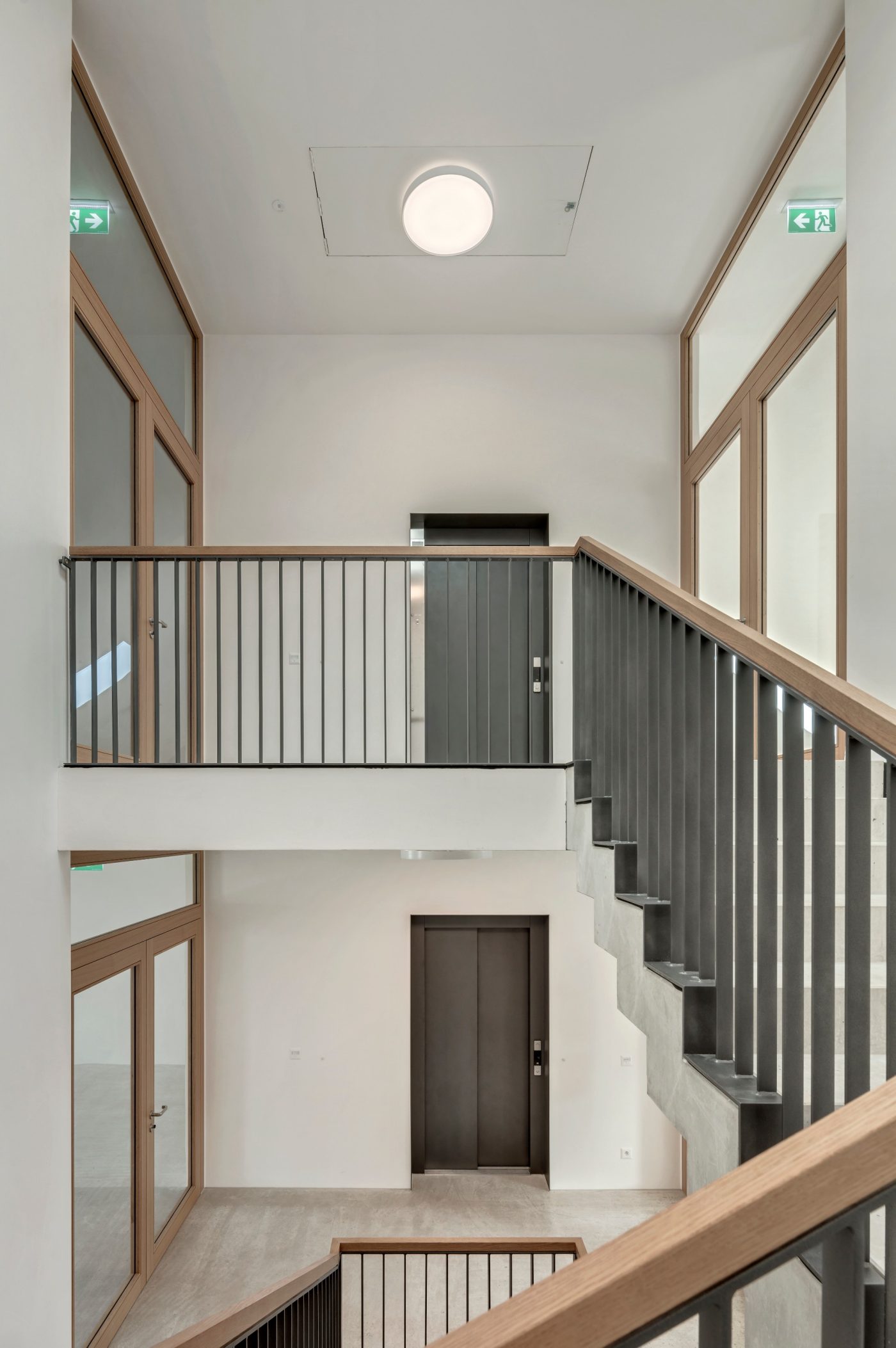 2226 Emmenweid. Brick Award 22 Category "Working together". Baumschlager Eberle Architekten. Staircase view