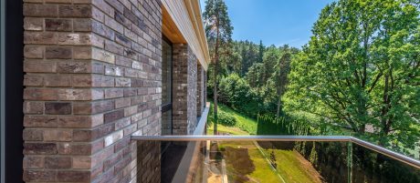 Split Level House Surrounded By Pines