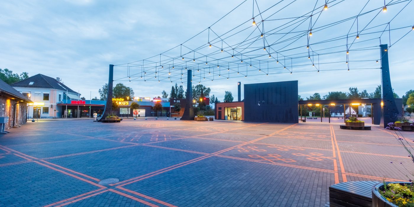 The central square in the town of Tõrva, Tõrva tower and bus station, ,Estonia. Used materials: Penter pavers Red Rough and Grafit Rough from Aseri plant (Estonia). Architect: Arhitektuuribüroo Arhitekt Must OÜ (Mari Rass, Ott Alver, Alvin Järving). Designer: Novarc Group AS. Client: Tõrva Linnavalitsus. Constructor: AS Merko Ehitus Eesti. Photographer: Arno Mikkor.