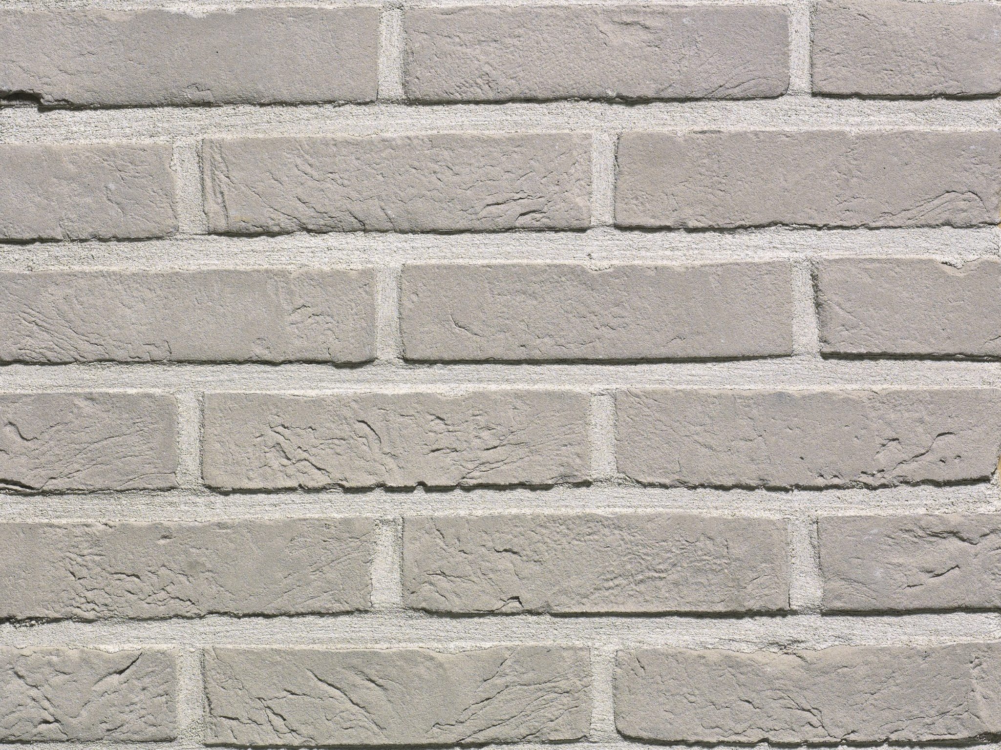 Packshot of a panel with Agora zilvergrijs facing bricks