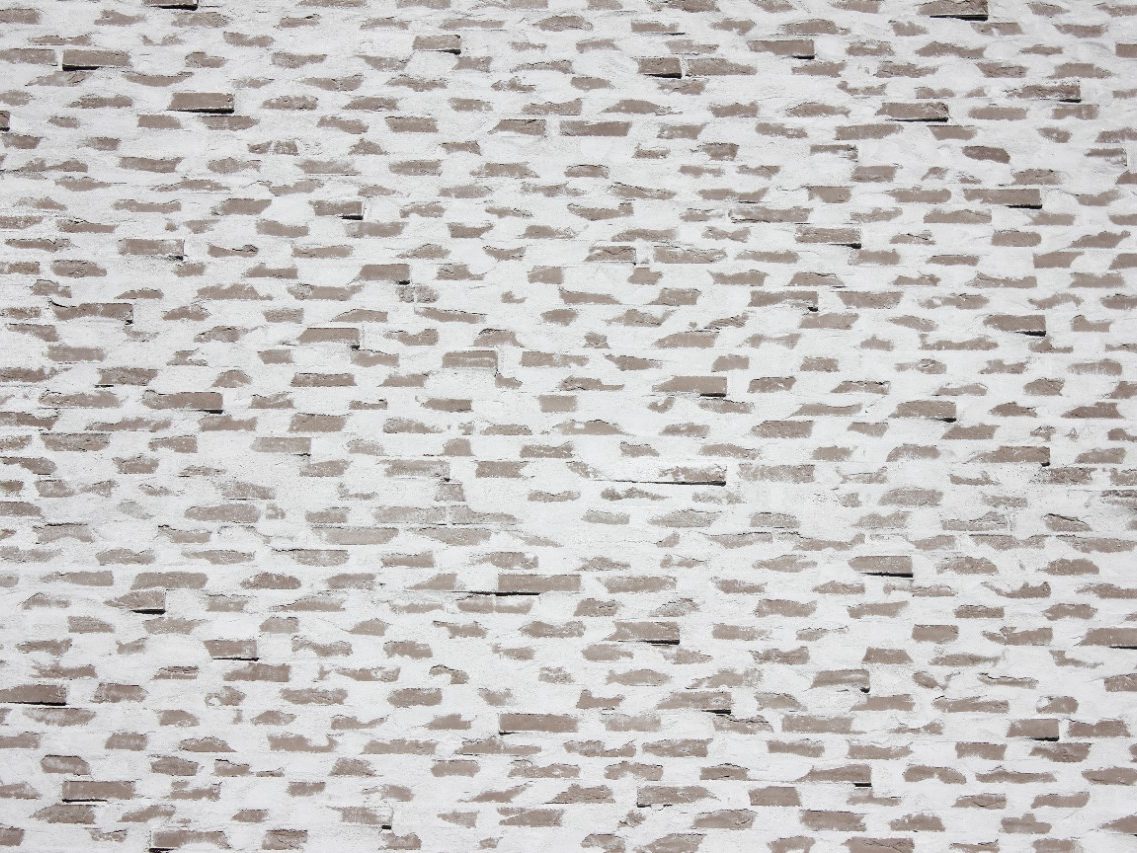 Multistore building with special joint, Supewhite and Tummapellava Retro facing bricks