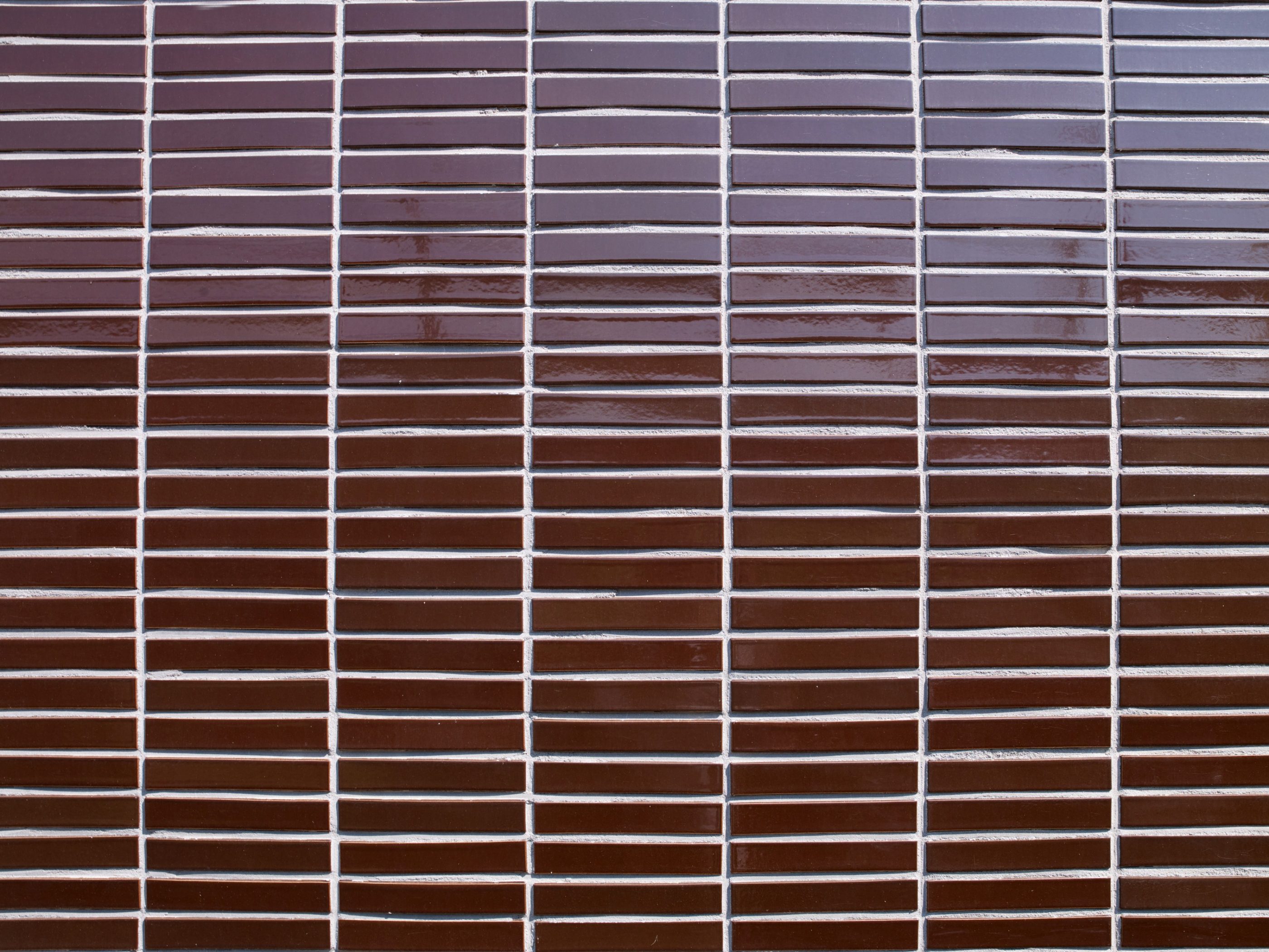 Renovation Elsevier Office Building for Student Housing, Sara Burgerhartstraat, Amsterdam. Completion Date: 2015. Contractor: N.J. de Nijs en Zonen. Architect: Knevel architecten, Amsterdam. Photographer: Leonard Fäustle. Bricks: Terca glazed bricks.