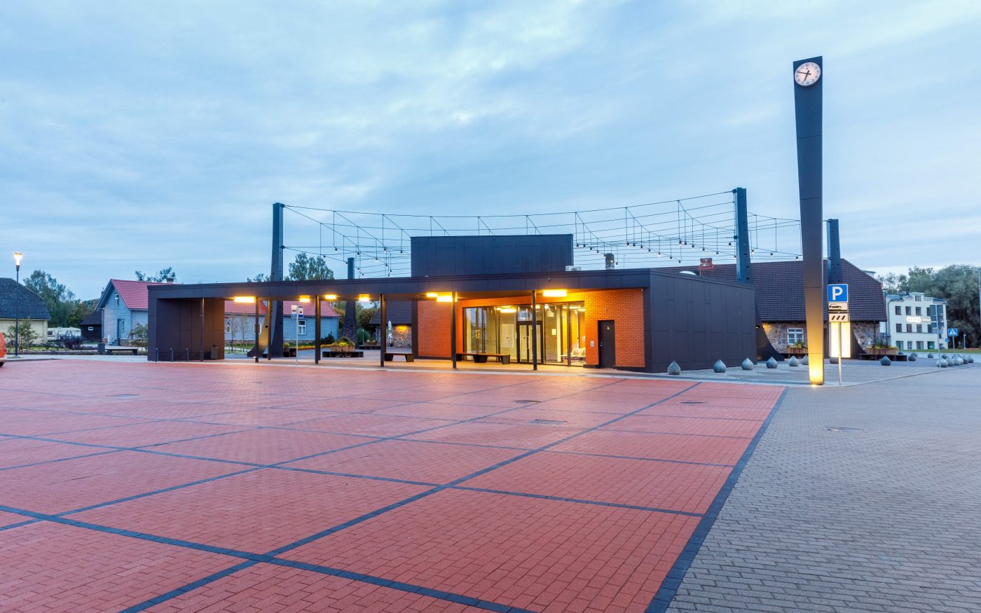 The central square in the town of Tõrva, Tõrva tower and bus station, ,Estonia. Used materials: Penter pavers Red Rough and Grafit Rough from Aseri plant (Estonia). Architect: Arhitektuuribüroo Arhitekt Must OÜ (Mari Rass, Ott Alver, Alvin Järving). Designer: Novarc Group AS. Client: Tõrva Linnavalitsus. Constructor: AS Merko Ehitus Eesti. Photographer: Arno Mikkor.