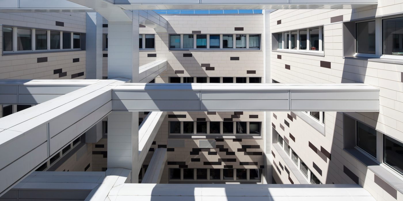 Plublic space with 4 levels. Rue Nationale 59000 Lille. Products Argelite tints  blanc carrare, gris basalte, gris métal.