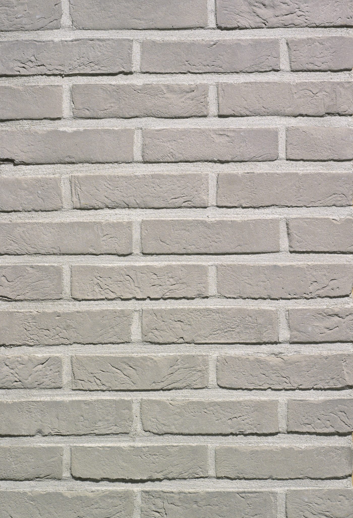 Packshot of a panel with Agora zilvergrijs facing bricks