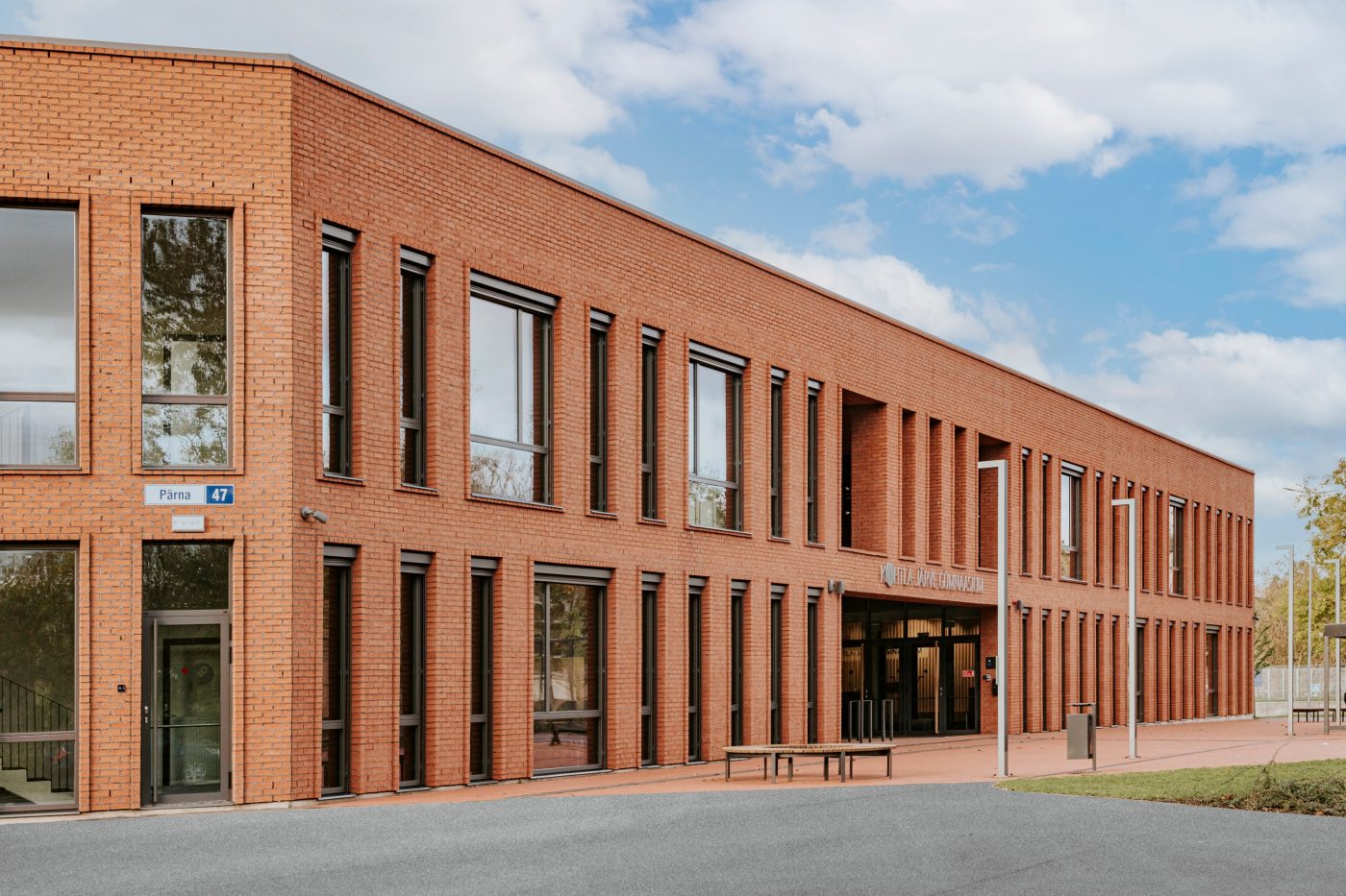 Kohtla-Järve Gymnasium in Kohtla-Järve, Estonia. Used materials: Terca St. John's ceramic bricks and brick slips, Penter Red Rough clay pavers from Aseri plant (Estonia).