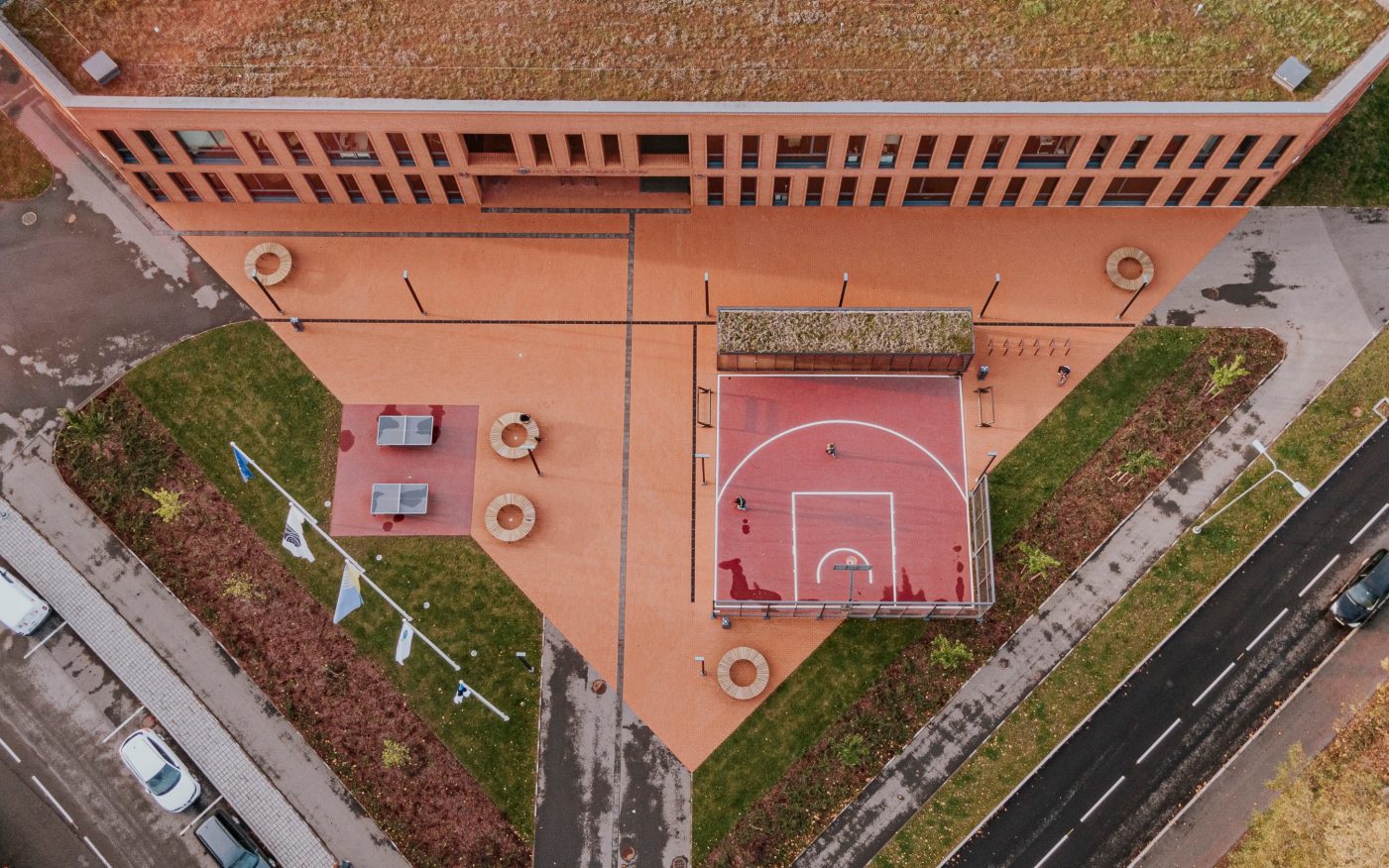 Kohtla-Järve Gymnasium in Kohtla-Järve, Estonia. Used materials: Terca St. John's ceramic bricks and brick slips, Penter Red Rough clay pavers from Aseri plant (Estonia).