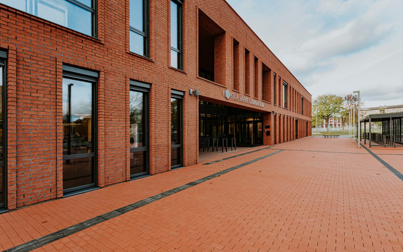 Kohtla-Järve Gymnasium in Kohtla-Järve, Estonia. Used materials: Terca St. John's ceramic bricks and brick slips, Penter Red Rough clay pavers from Aseri plant (Estonia).