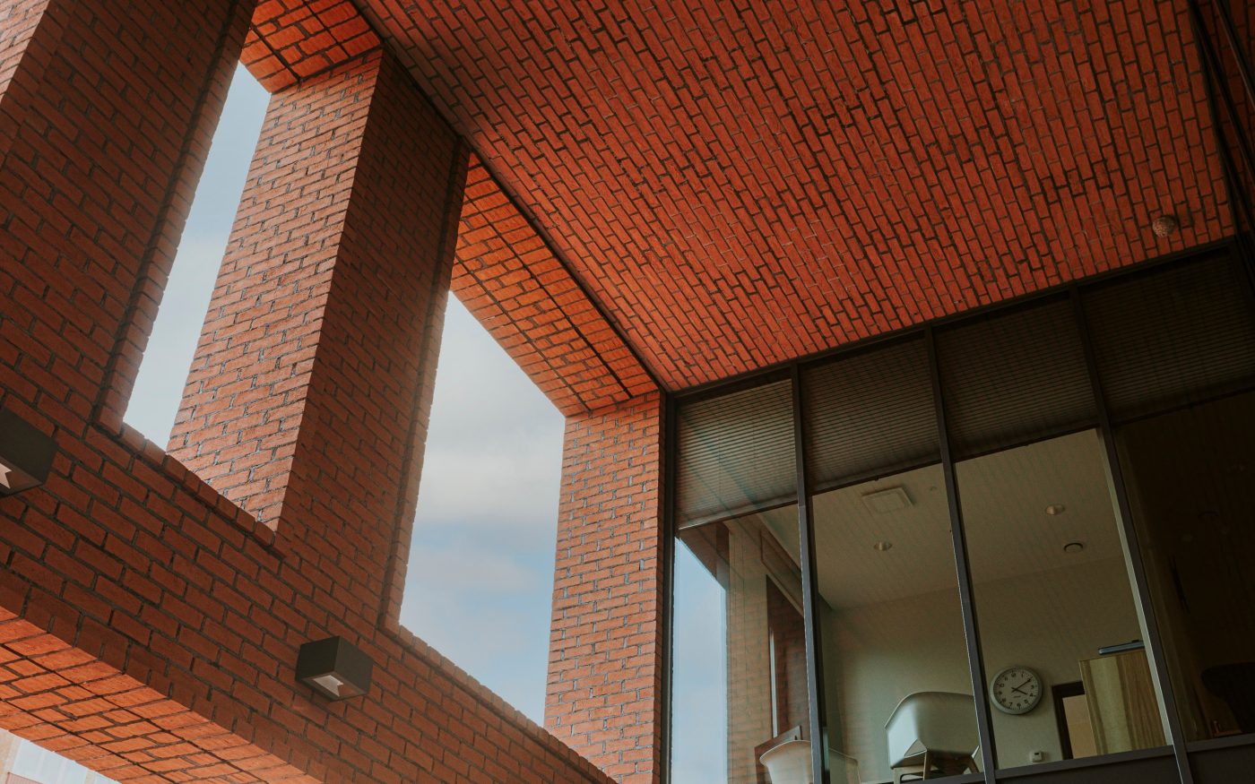 Kohtla-Järve Gymnasium in Kohtla-Järve, Estonia. Used materials: Terca St. John's ceramic bricks and brick slips, Penter Red Rough clay pavers from Aseri plant (Estonia).